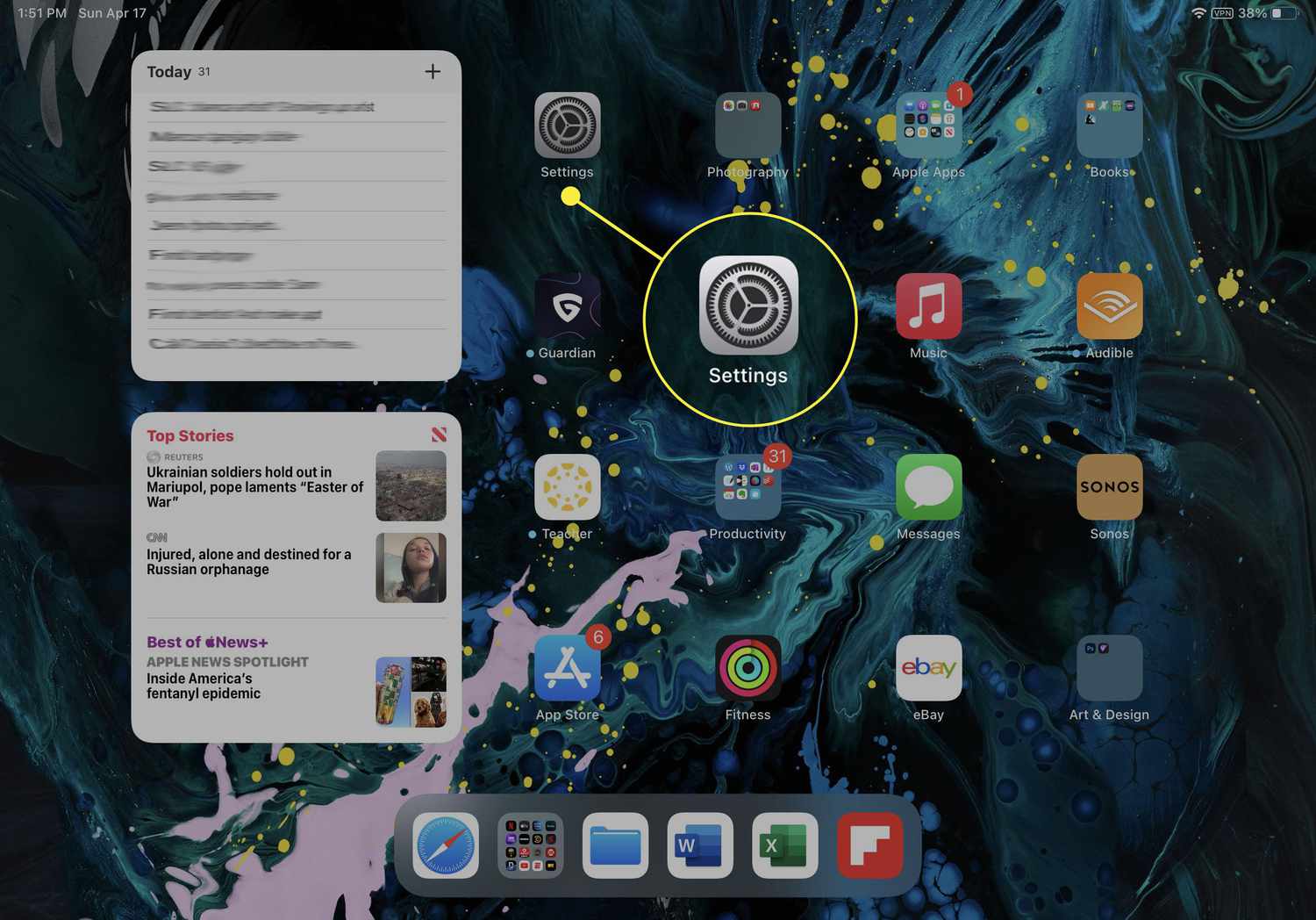 L'icône de l'application Paramètres a été mise en évidence sur l'écran d'accueil d'un iPad.